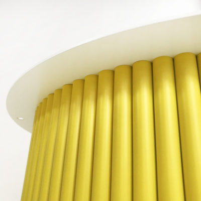 Стол из массива дерева на двух опорных круглых ножках с фасадом ножек из скругленных реек желтый