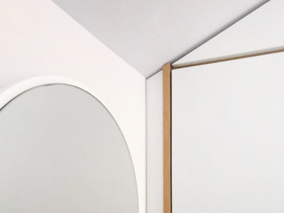 Функциональный гардеробный шкаф скошенный под форму потолка - Woodkivi